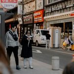 Tourist using Korea travel apps for foreigners while exploring Seoul