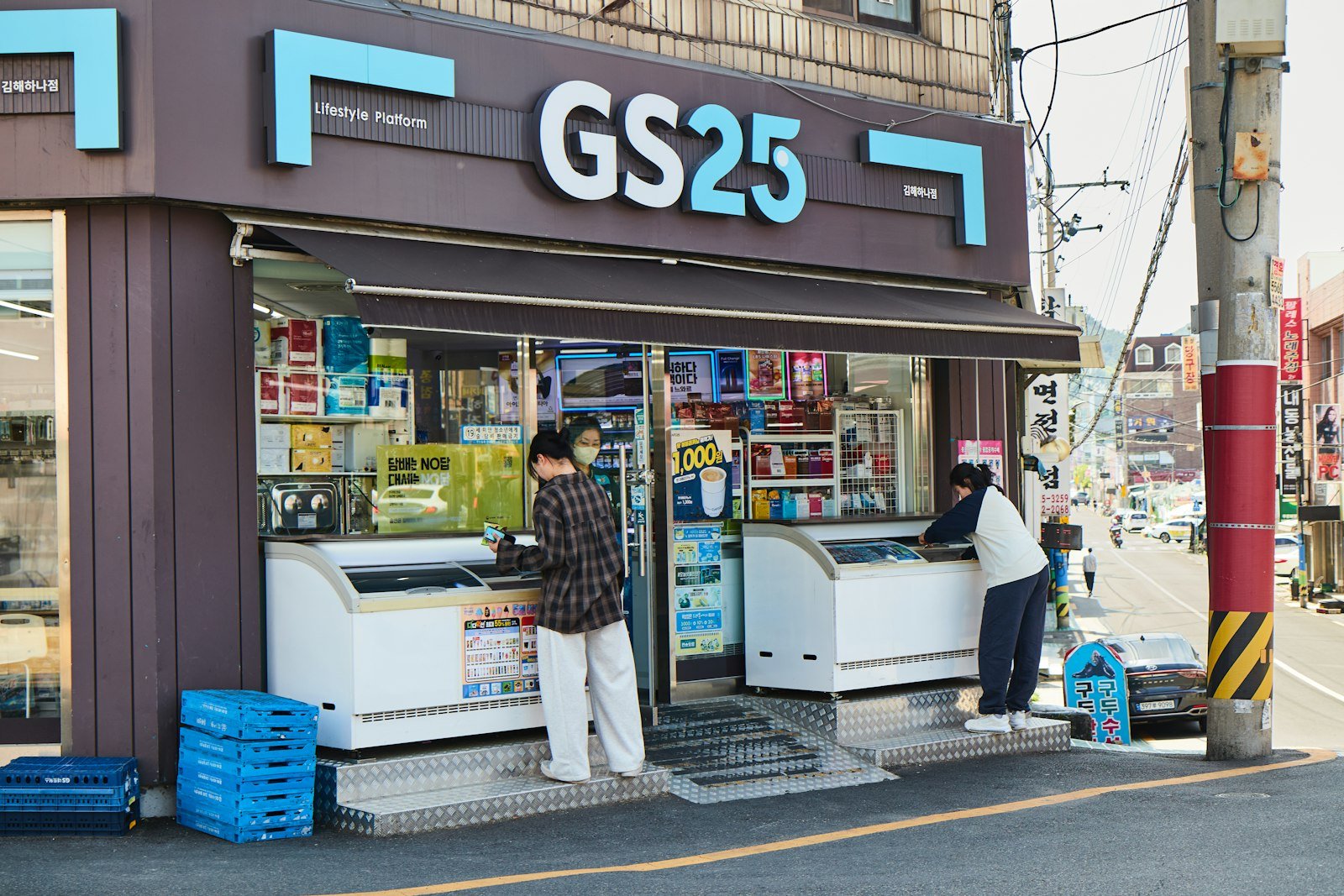 Customers at a GS25 convenience store in Korea, one of the places that sell T-money cards
