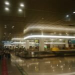 Baggage claim hall at Incheon Airport, where the choice between AREX and an airport bus begins